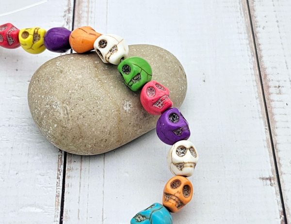 WSH116 37 perles tête de mort multicolores 10x8mm