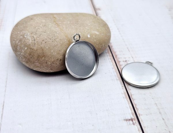 10 pendentifs plateau cabochon 16mm en acier inoxydable